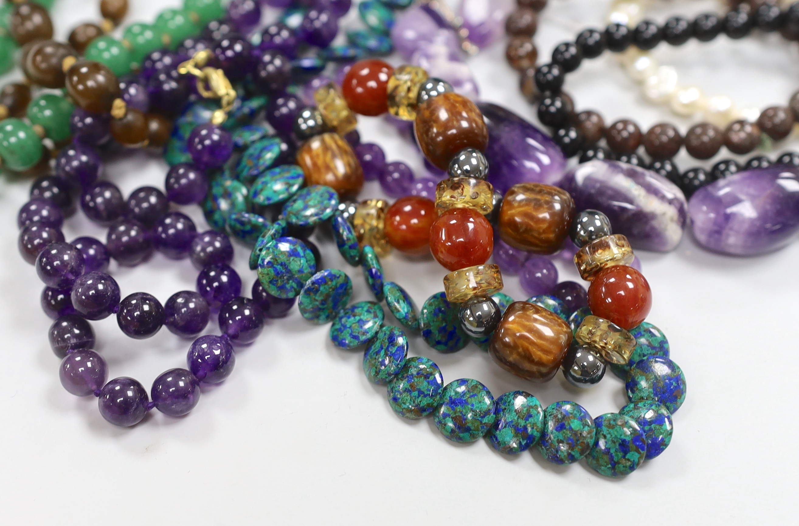 A group of assorted bead necklaces